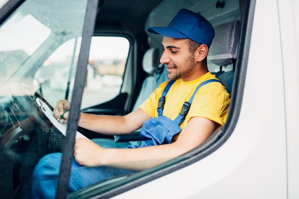 cargo delivery driver courier sitting in truck