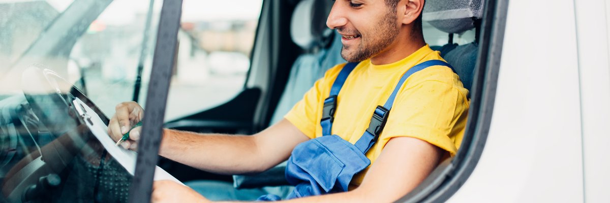 cargo delivery driver courier sitting in truck