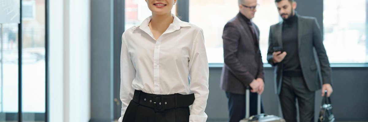 happy young successful female business traveler